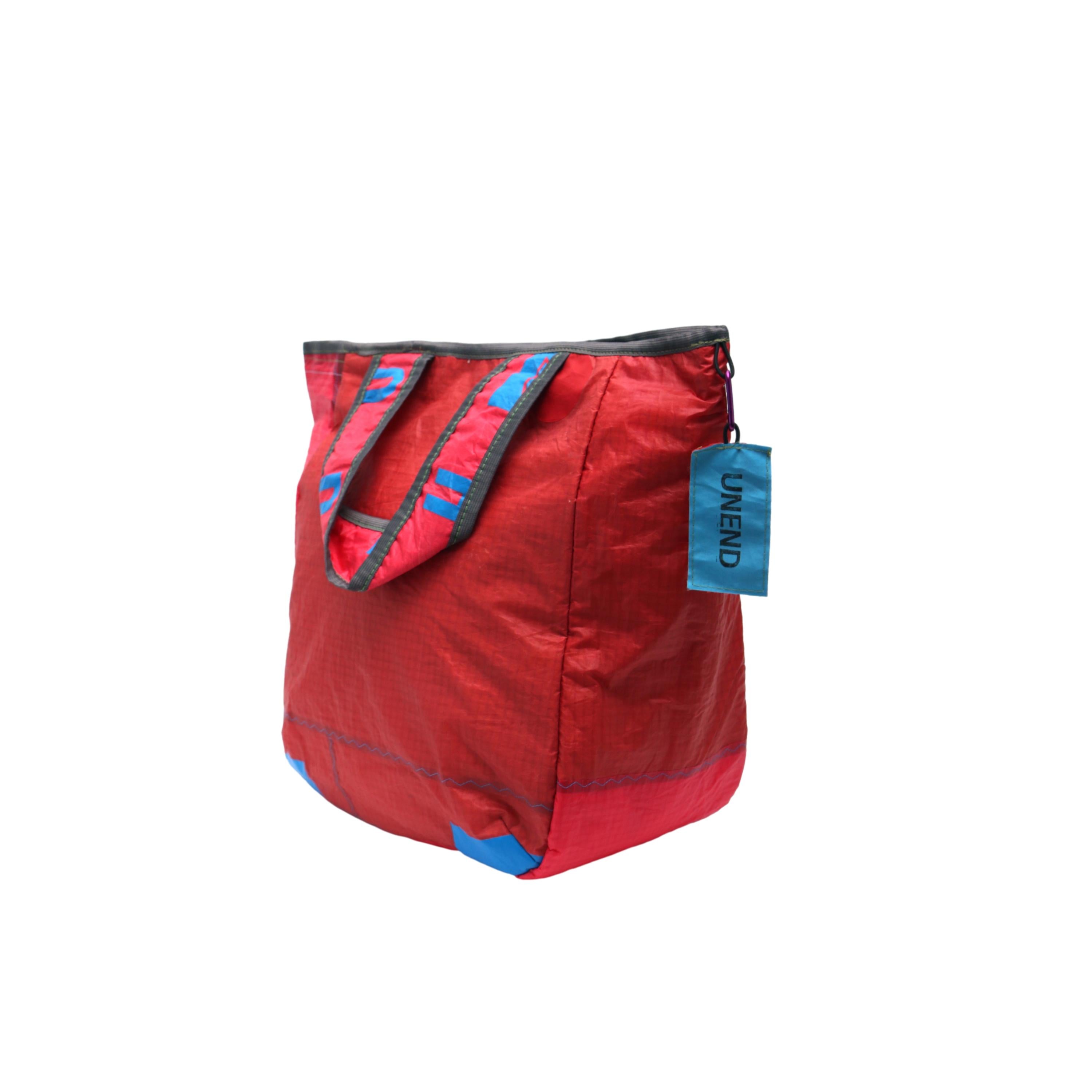 Sacola UNEND x Instituto Dharma Vermelha e Azul